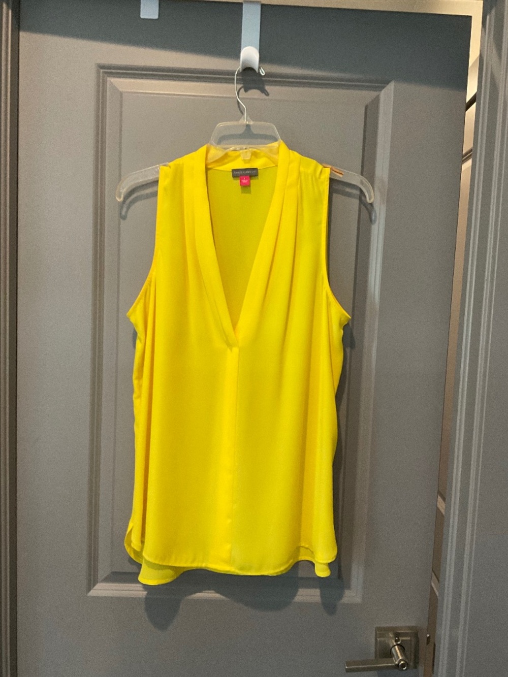 Yellow sleeveless blouse